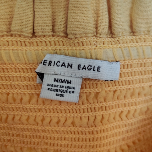 American Eagle Mustard Yellow Smocked Bodycon Ruffled Mini Dress - Picture 5 of 6